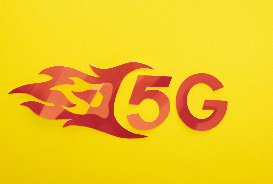 Flaming 5G symbol on a vibrant yellow background, symbolizing the fiery speed and impact of 5G technology.